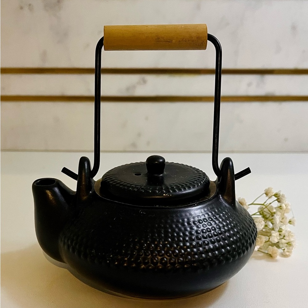 Mini ceramic tea kettle with metal/wooden handle
